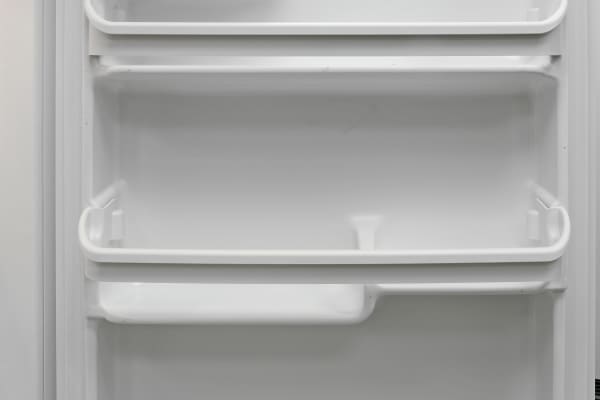 You can't move any of the Frigidaire FFTR1814QW's door shelves, but at least they offer storage options in varying heights.