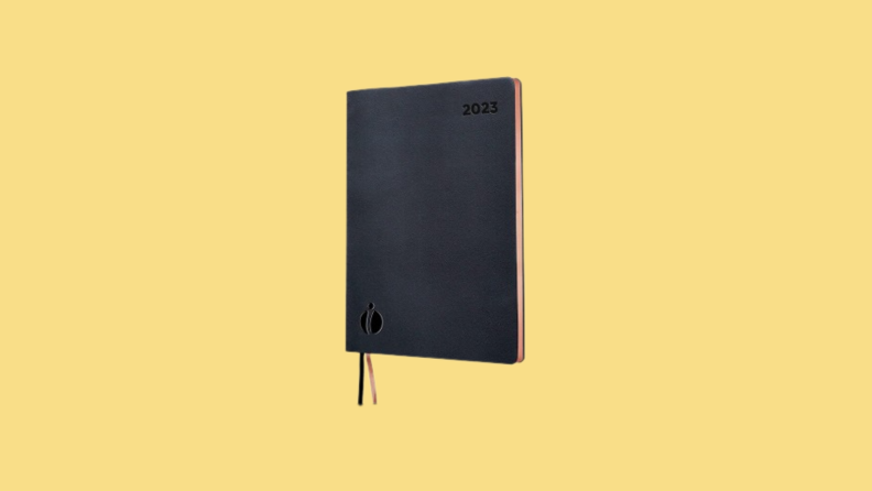 Planner against yellow background