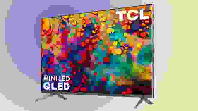 Smart tv with display on in front of colorful background.