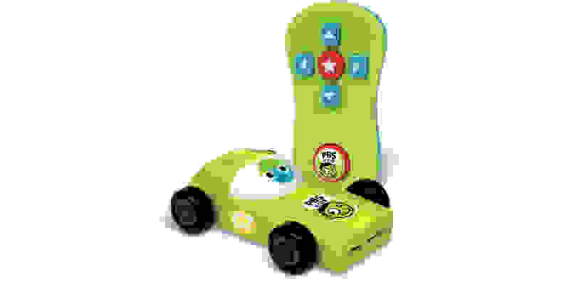 The PBS Kids Plug & Play streaming stick is shaped like a racecar and comes with its own simple remote.