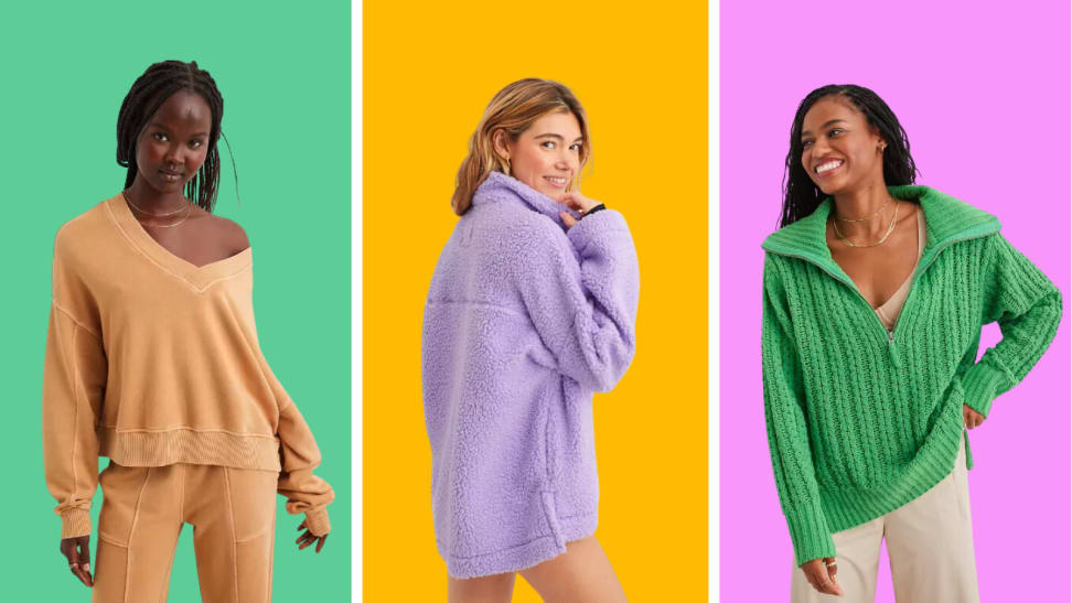 An image of three models wearing Aerie apparel, including a v-neck camel sweatshirt and sweatpants, a purple, fluffy pullover, and a green pullover with a zippered collar and cable knit details.