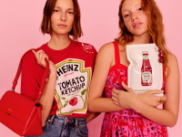 Two models wearing clothing and accessories from the Kate Spade New York x Heinz collaboration.