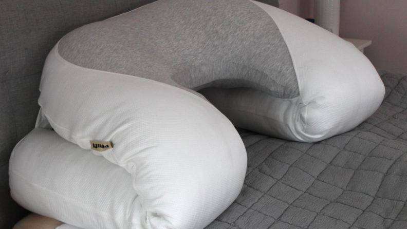 The Hugl body pillow folded up so it can be used for sitting upright.