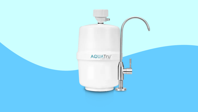 AquaTru water filter on wavy blue background