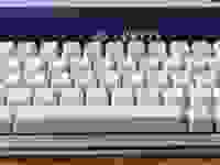 A close up of a white keyboard