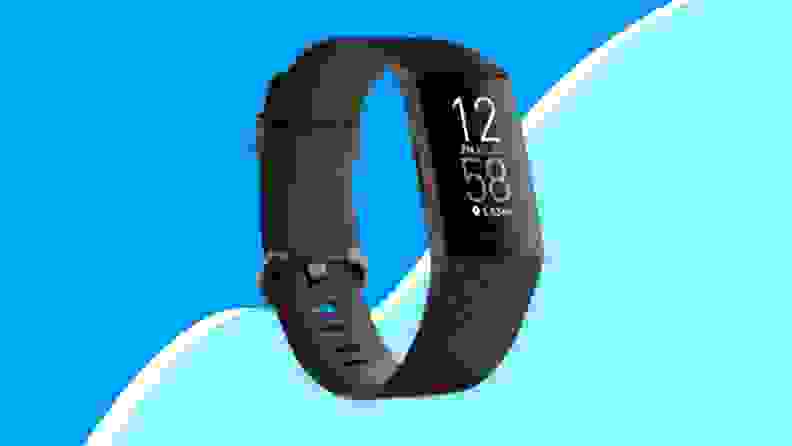 Black fitness tracker on blue background
