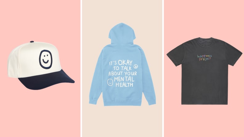 A baseball hat, the back of a sweatshirt that reads