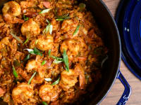 A pot full of homemade jambalaya with the lid removed, shot from above.