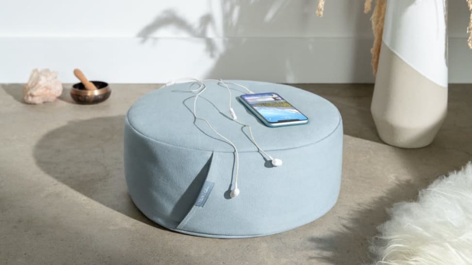 Meditation pillow with phone on top