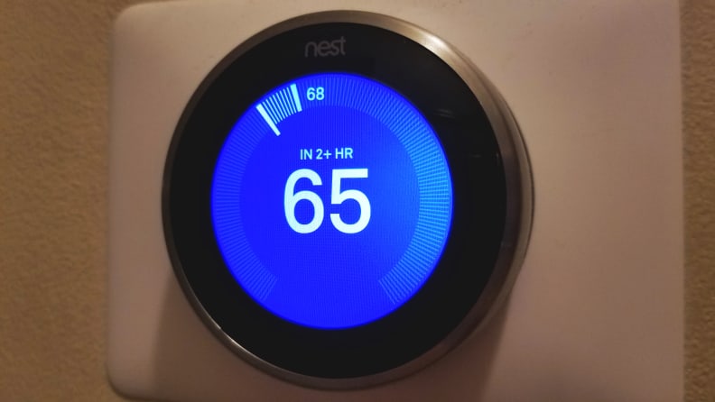 The Nest Learning Thermostat (third-gen) hanging on the wall