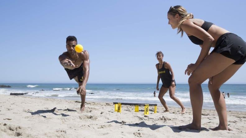 People play frisbee outside.