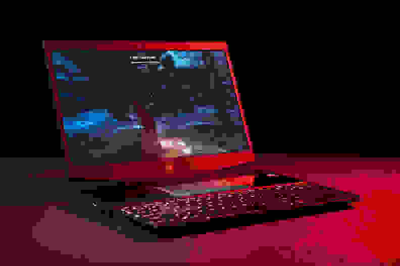 A laptop is in ominous red lighting