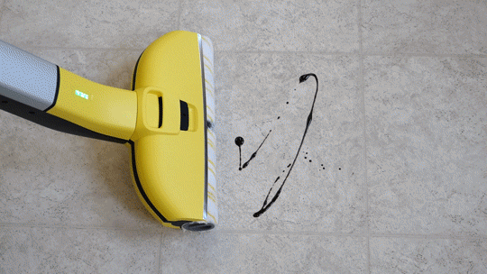 The Karcher FC3 cleaning chocolate syrup off the floor