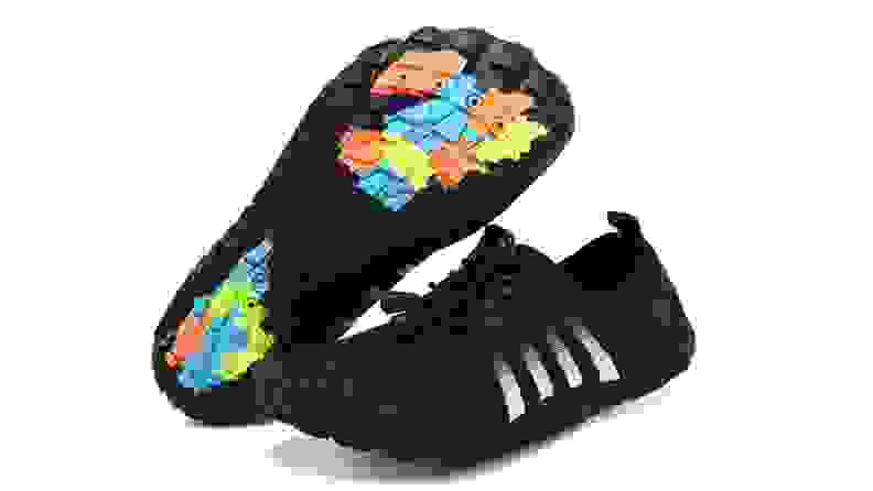 Black water sneakers with colorful soles