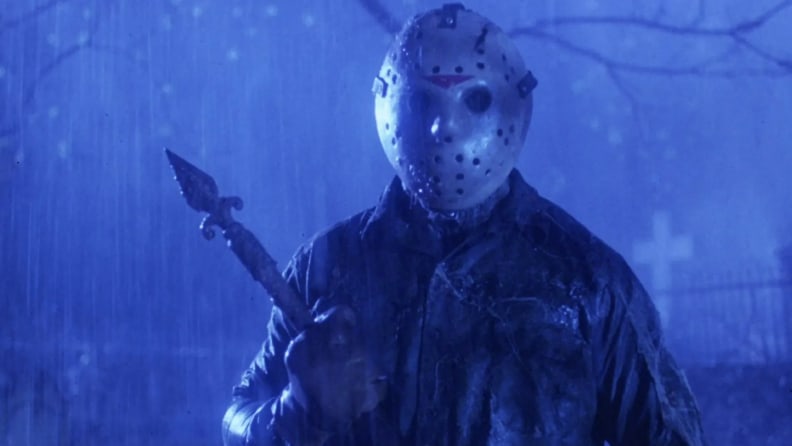 Jason Voorhees, the villain of the "Friday the 13th" series, in the rain, holding a spear.