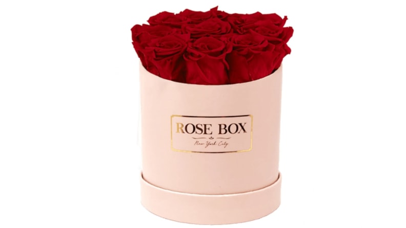 A round box of red roses