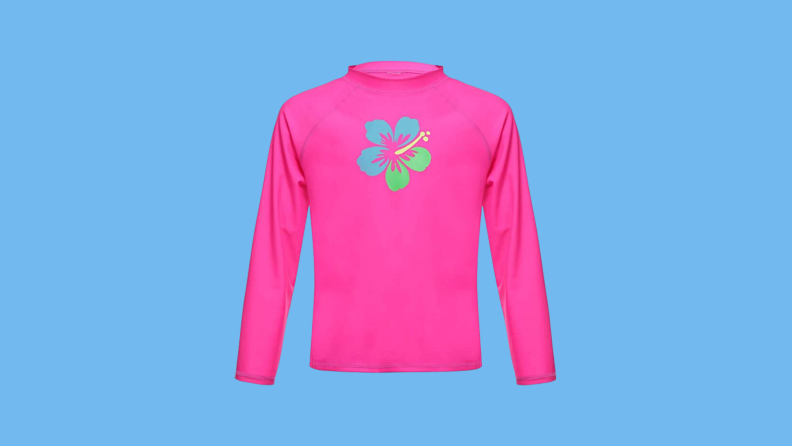 Product image of a Dayu rash guard on background.