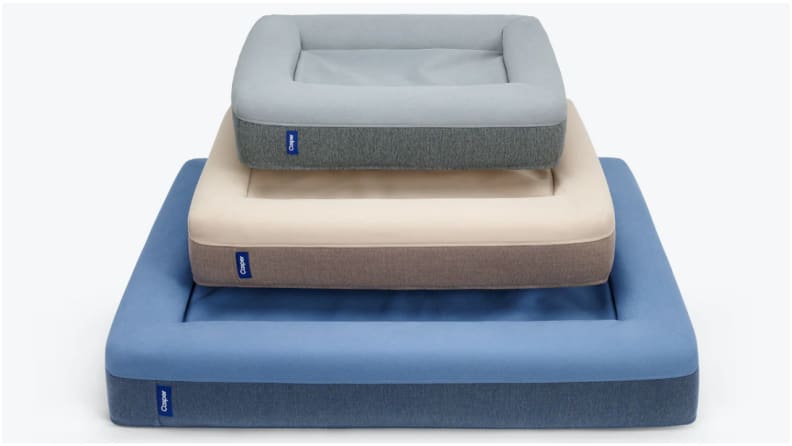 A small-, a medium-, and a large-sized dog bed stacked on top of each other