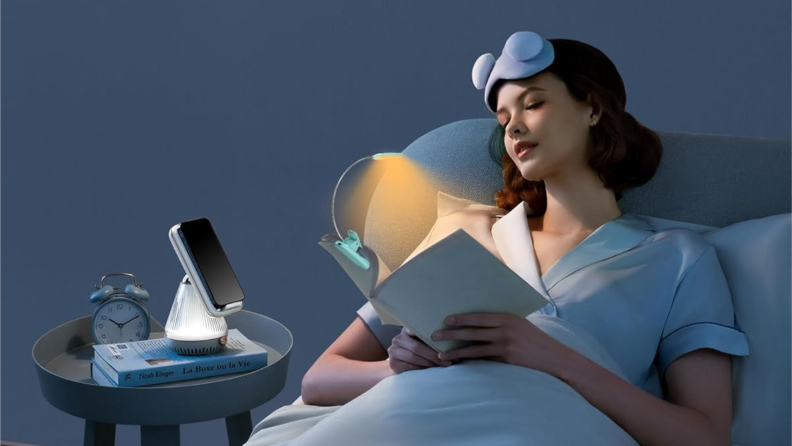 Illustration of a person sitting upright in their bed while reading at night with the Glocusent Willow reading light shining yellow light on her book.