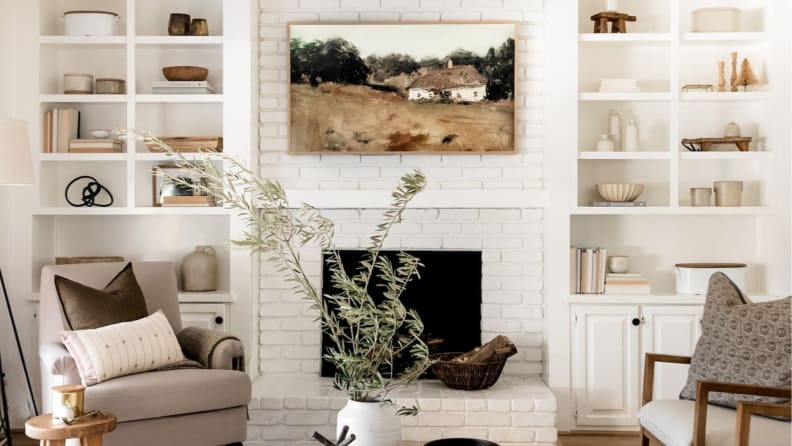 Digital art download printed and framed above a white fireplace