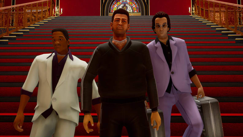 Screenshot from the video game 'Grand Theft Auto: The Trilogy - The Definitive Edition' showing off the main characters from 'Vice City.'