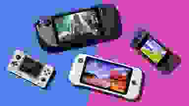 A variety of handheld gaming devices next to each other