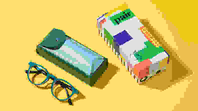 Eyeglasses and case on yellow background
