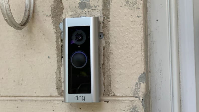 The Ring Video Doorbell Pro 2 hangs on a home.