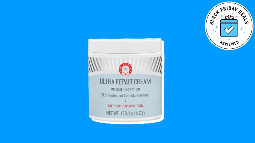 Picture of a moisturizer from First Aid Beauty against a blue background.