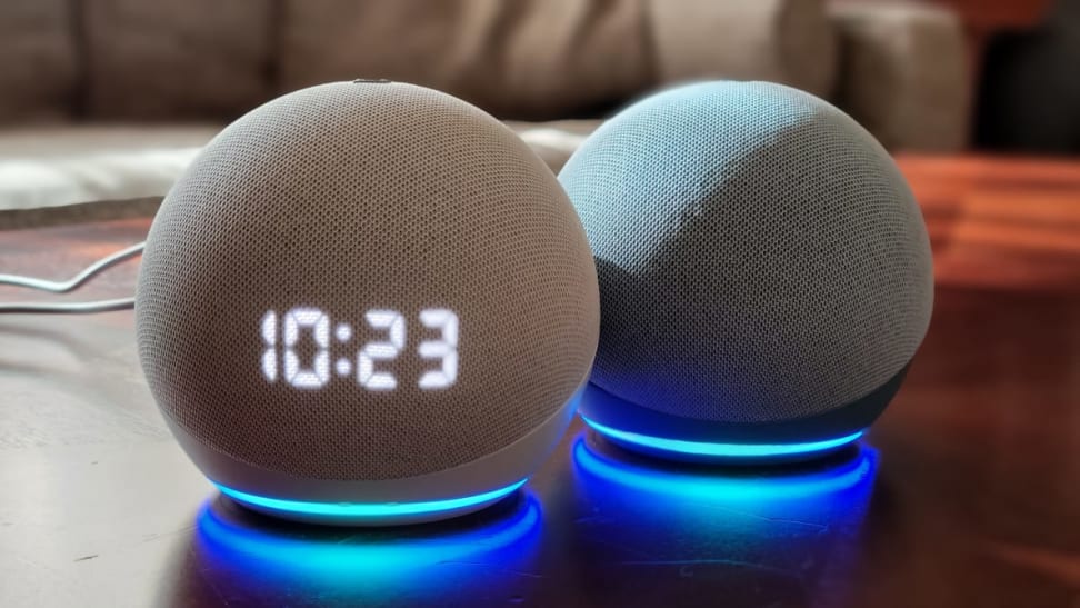 The Echo Dot with Clock (4th gen) sits on table.