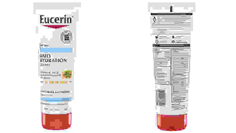 On the left: The Eucerin Daily Hydration Body Cream with SPF 30 sits on a white background. The bottle is white and has a red cap. On the right: The back of the Eucerin Daily Hydration Body Cream with SPF 30 is standing against a white background.