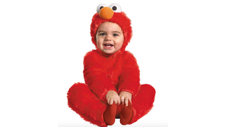 A baby dressed in an Elmo costume.