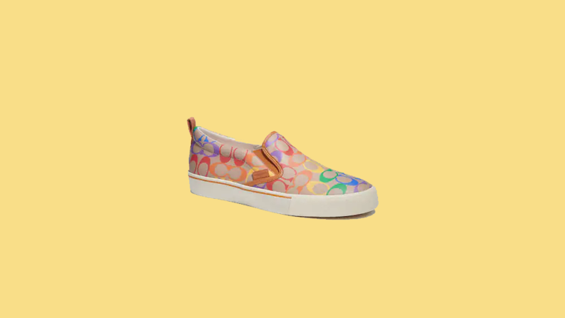 rainbow printed sneaker on yellow background