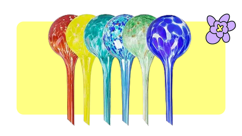 assorted colors of Miles Kimball Plant Watering Globes