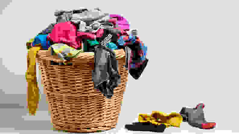 Laundry basket filled with dirty clothes - How often to wash your clothes