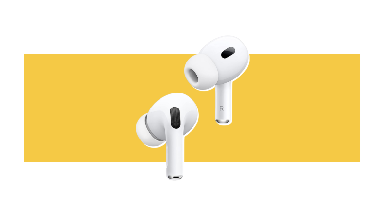 A pair of Airpods Pro against a yellow background