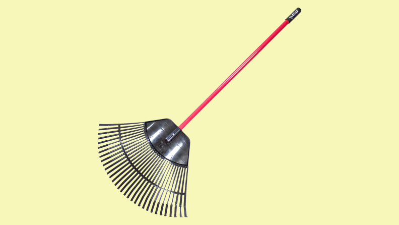 A wide tined Bully Tools rake floats over yellow.