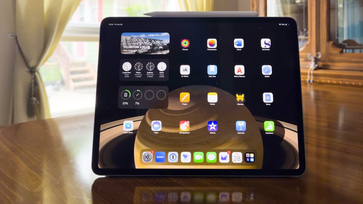 An iPad Air on a wood dining room table.