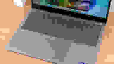 A close up of a laptop's trackpad and keyboard