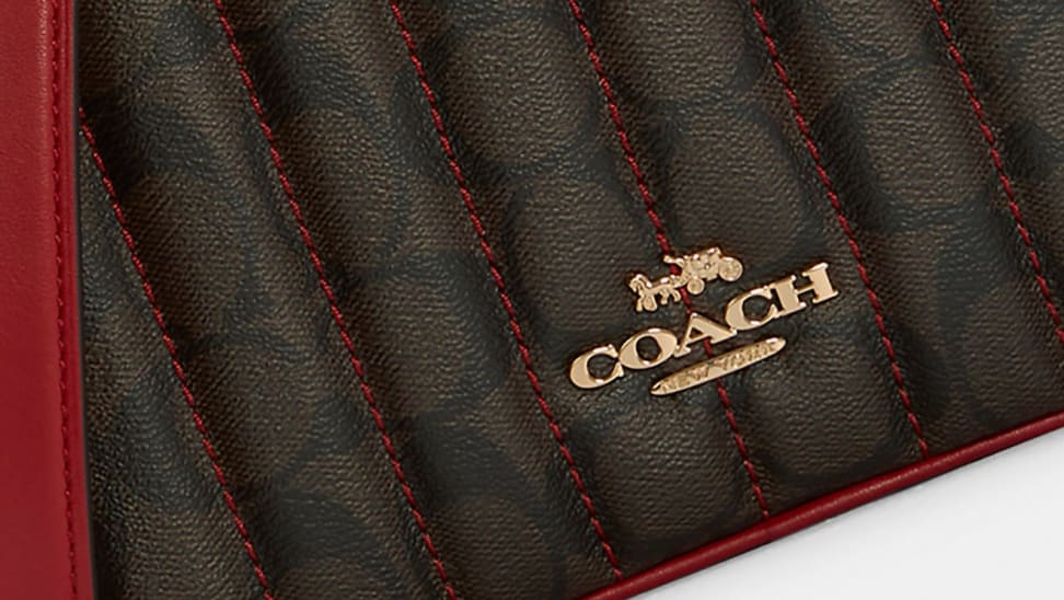 Close up of leather Coach bag.