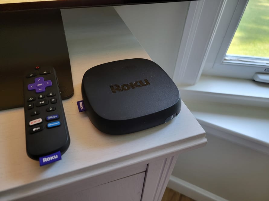 The Roku Ultra 2022 on a TV stand