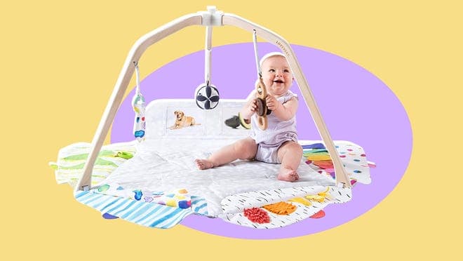 baby in play gym
