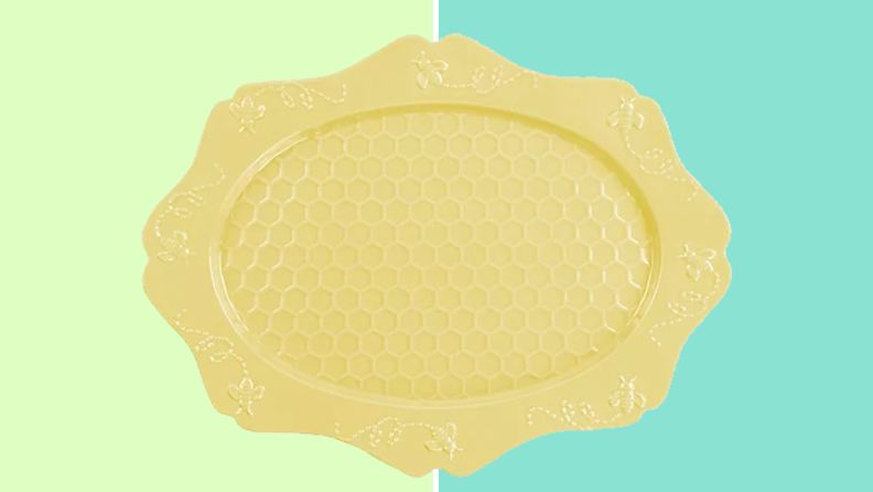 Yellow platter on a blue and green background