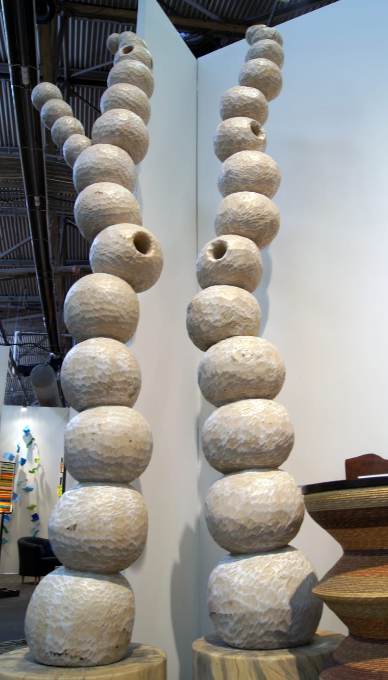 These towering structures were made using the leftover pulp that was on hand after creating the small side tables seen in the lower right.