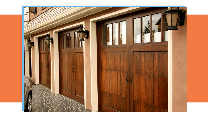 Modern wooden garage doors outdoors.