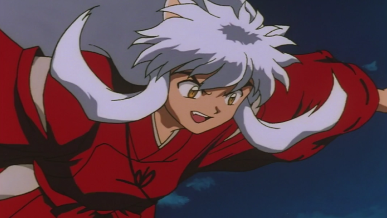 A still from Inuyasha featuring the title character in the air, in red robes with his arms outstretched.