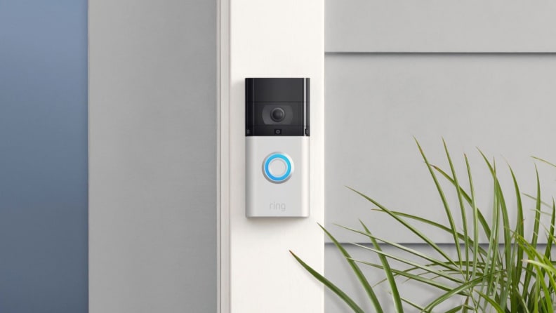 Ring video doorbell next to door