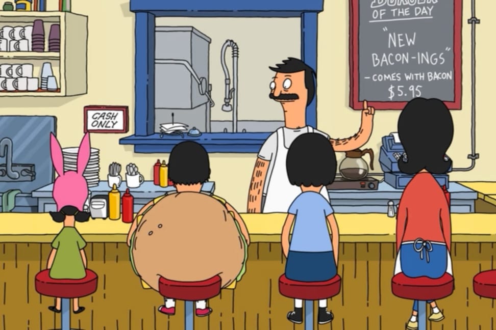 Bob's Burgers characters and the burger of the day sign