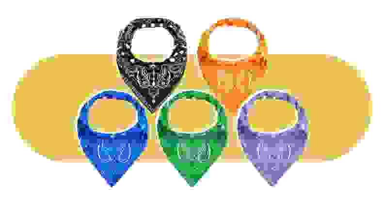 A collection of five Jiuguva bibs in different colors on a colorful background