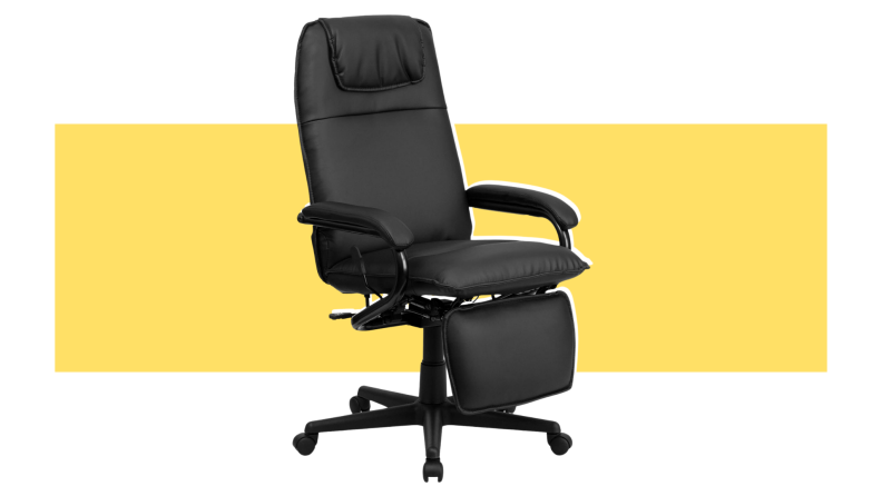 A leather Flash Furniture Executive Swivel Chair with footrest extended outward in front of yellow background.